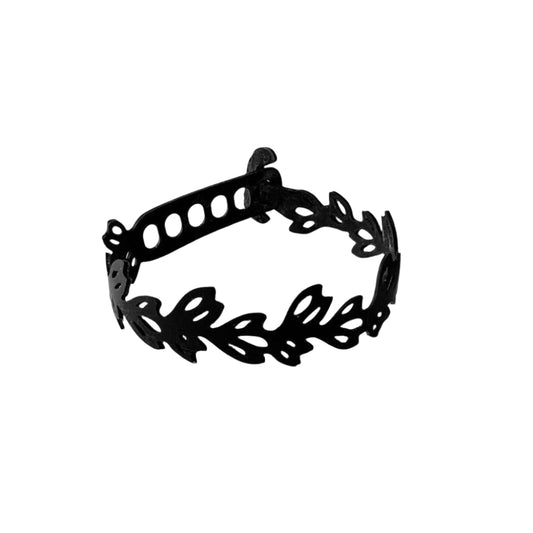 Black leaf-patterned headband on a white background